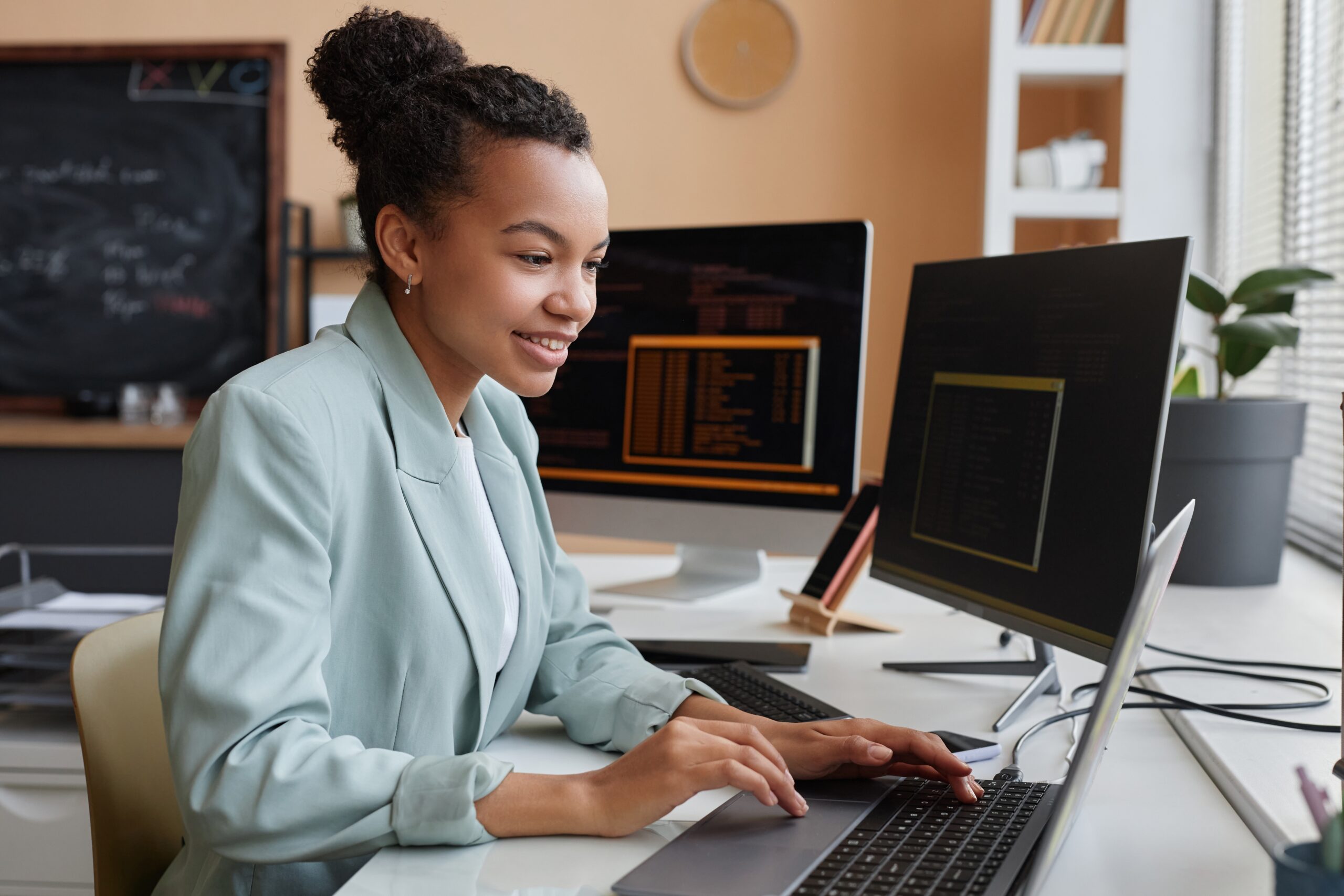 Side View Portrait of Young Black Woman Programming Code